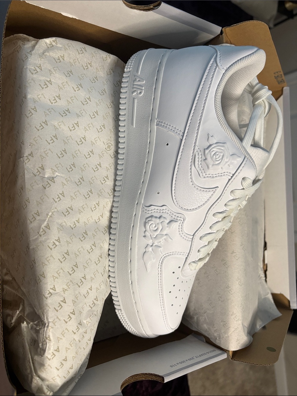 Nike Women’s White Embossed Rose Air Force 1 Sneaker